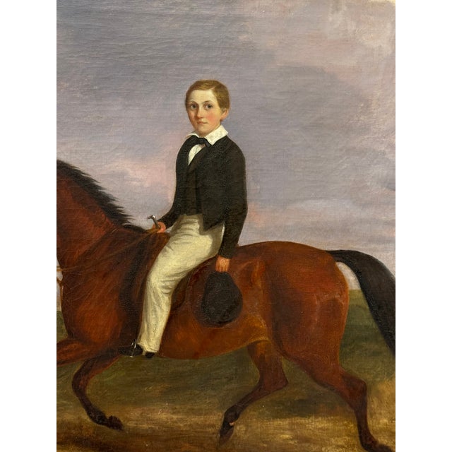 A charming equestrian oil on canvas depicting a young rider on horseback in a lush English countryside. Beautifully...