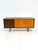 Elegant vintage sideboard in a mid-century style, likely from the 1960s. The piece impresses with its clean, low lines,...
