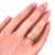 Authentic and elegant by Cartier is a lovely triple stand band ring, crafted from 18k yellow, pink and white gold...