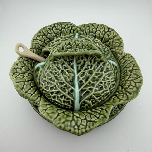 Bring the charm of traditional Portuguese ceramics to your table with this beautiful **Vintage Costa Pereira Majolica...