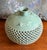 A celadon crackleware glaze, with cranes and clouds on the shoulder of the vase, with exquisite latticework surrounding...