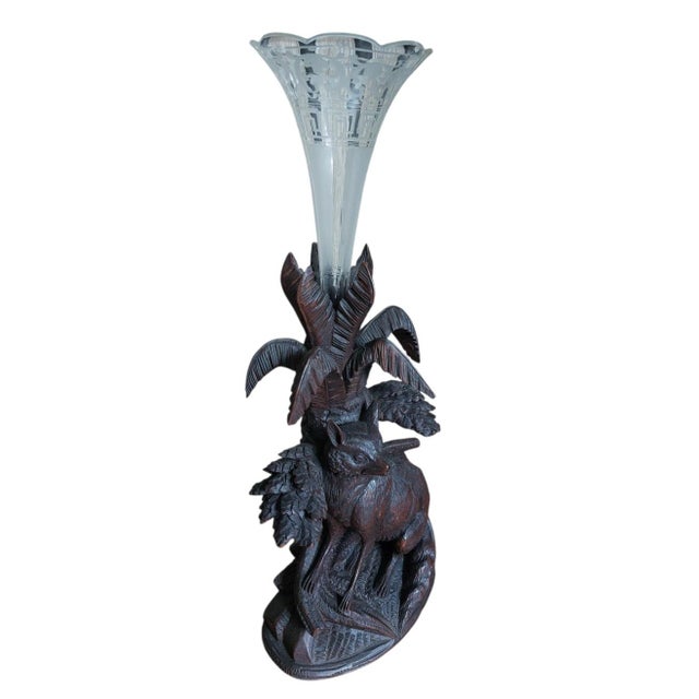 A wonderful black forest vase, more unique than rare a Fox figure resting in a pineapple tree with a stunning variety of...