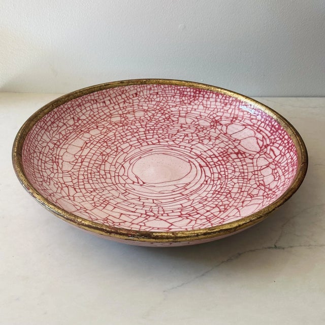 Vintage Hand Thrown Italian Ceramic Charger Bowl in Red Crackle Glaze With Gold Border Measures approx: 18D x 3H Please...