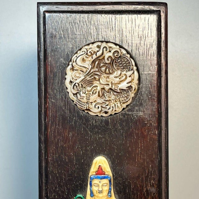This striking vintage wooden box is a beautiful example of traditional Chinese craftsmanship. Crafted from ebonized wood...