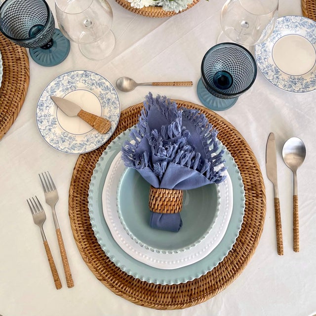 Introducing the Rattan Stainless Steel Cutlery Set of 5, the perfect addition to any dining table. This elegant set...