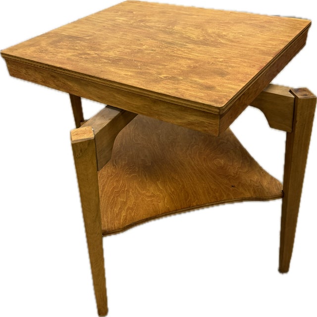 This vintage mid-century modern coffee table is a fine example of American craftsmanship, designed and produced by...