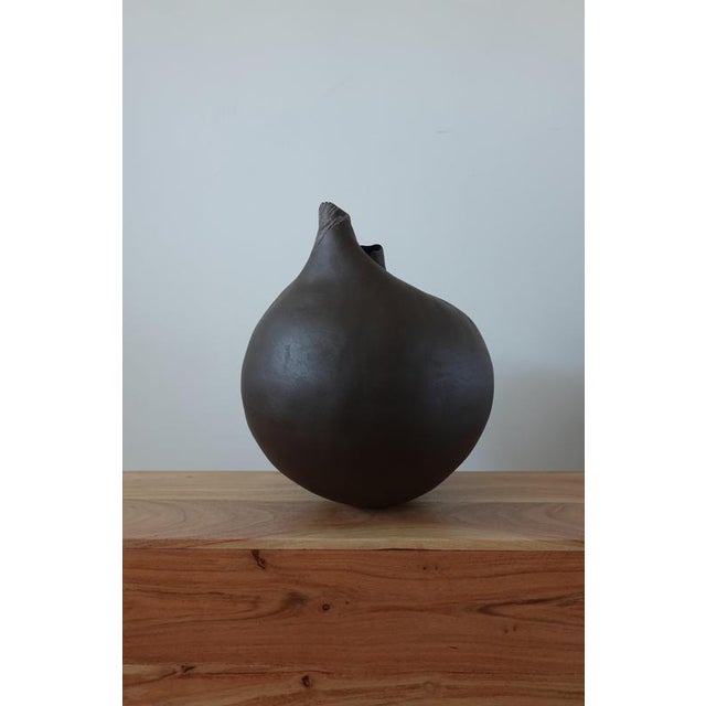 Vestiges ii sculptural ceramic vase by audrey vo van dimensions: d 26 x w 26 x h 31 cm materials: black clay (stoneware) -...