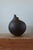 Vestiges ii sculptural ceramic vase by audrey vo van dimensions: d 26 x w 26 x h 31 cm materials: black clay (stoneware) -...