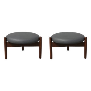 Mid Century Style Round Walnut and Black Leather Ottomans For Sale