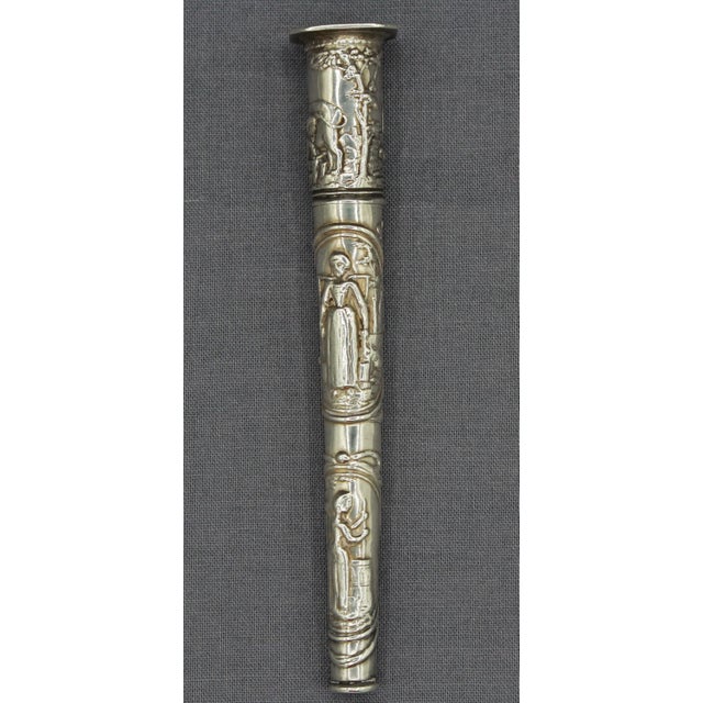 19th century Continental silver needle case. The case decorated with milkmaids carrying milk to market & churning butter;...