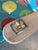 Iconic vintage late 1950s / early 1960s mod patio or poolside chaise lounge with wood paddle arms and a built-in ashtray!...