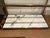 Stylish Revelation Floating Plane Etagere. Brass frame, marble bottom. Glass shelves. Original Retail $6465. Showroom...