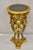 Egyptian Revival Style Gold Giltwood Round Marble Top Figural Pedestal Plant Stand. Item features tripod base with winged...