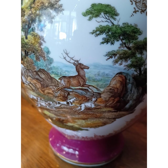 A Dresden porcelain covered Urn attributed to the renowned workshop of Helena Wolfsohn, richly decorated in a Rococo...