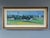 ACROSS THE COUNTRYSIDE Size: 15.2 x 30.9 inches (including frame) Oil on canvas A serene mid-century landscape that...