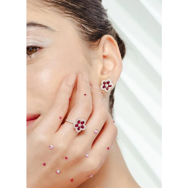 Everyday Ruby and Diamond Cherry Blossom Flower Stud Earrings in 18K Gold to make a statement with your look. You shall...