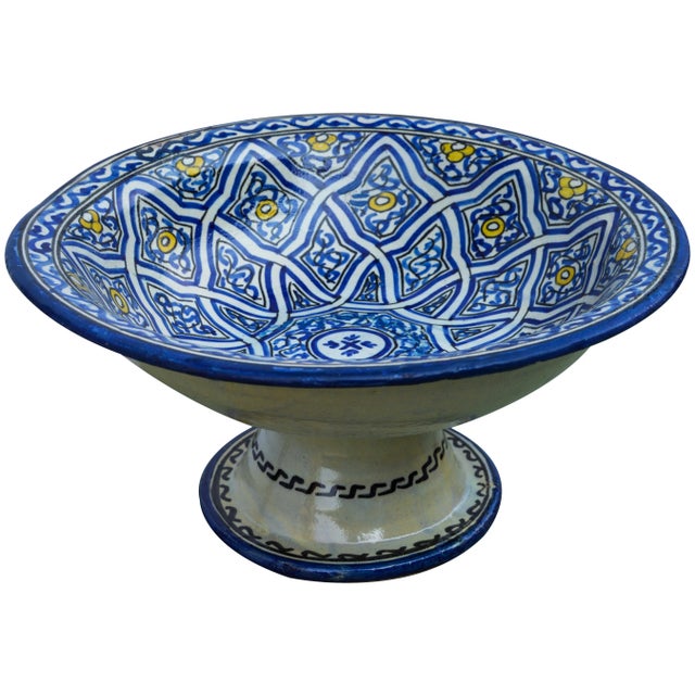 Handcrafted ceramic pedestal bowl featuring an elaborate hand-painted Moorish pattern in a traditional Andalusian color...