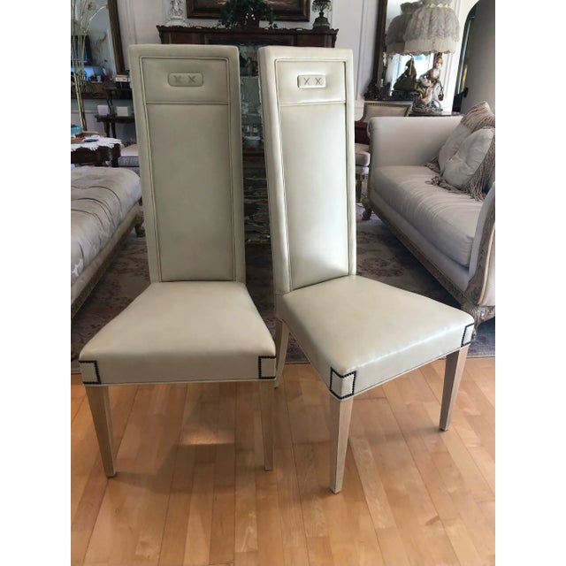 Vintage pair, Italian Style Custom Upholstered High Back Dining Accent Side Chairs. Champagne leather upholstery with...