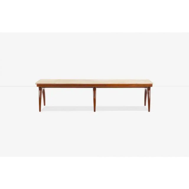 A 1960s coffee table attributed to Bertha Schaefer by Singer & Sons, USA having walnut base with six sculptural curved...
