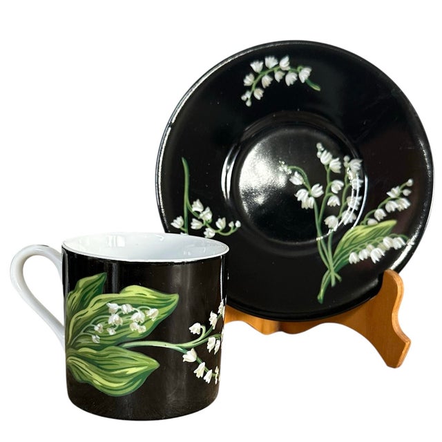 Four Tiffany & Co. Mrs. Delany’s Flowers cup and saucer sets, offered together as a coordinated collection. Each glossy...