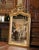 This elegant antique French mirror is distinguished by its richly carved grape and vine ornament, a particularly...