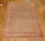 An illustrious dorokhsh rug with an inspiring all-over boteh design with shades of cinnamon and cocoa browns. Close-up...