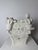 16th-century marble architectural fragment. Italy. This fragment features a central circle engraved with a six-petaled...