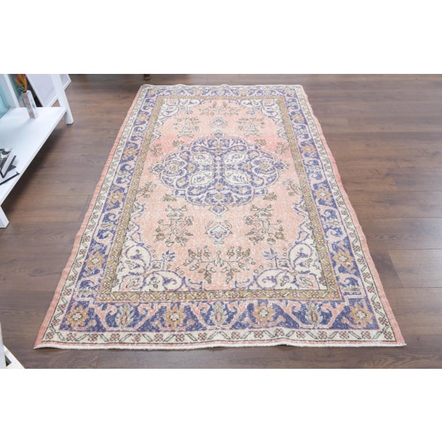 Vintage Turkish Hand-Knotted vintage rug is a semi-antique vintage area rug.'70s Eastern region of Turkey's unique rug is...