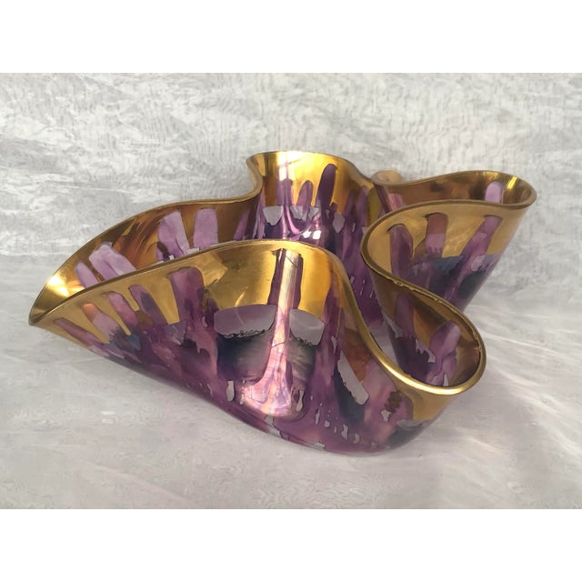 Artfully sculpted by artist Laurel Fyfe (1956 - 2011), known for her innovative use of the slumped glass process, this...