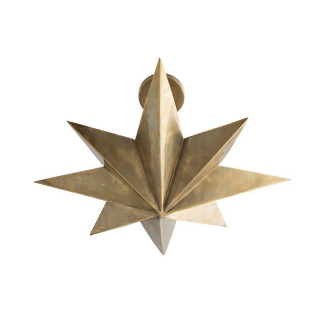 This eight-point star pendant provides sculptural interest, as well as a unique option for those rooms with low ceilings....