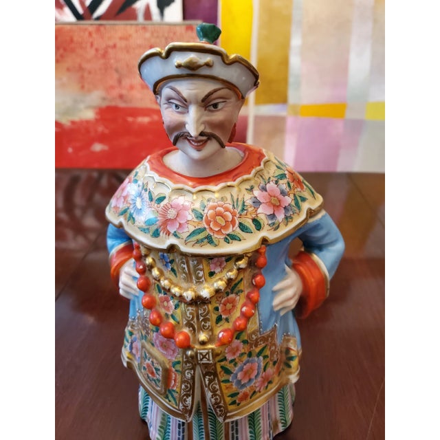 A genuine antique museum quality porcelain sculpture with impressed letters underneath. Super fine hand painted porcelain...