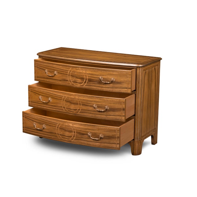 Graceful in form and rich in detail, this three-drawer chest showcases the artistry of matched veneers and fine...