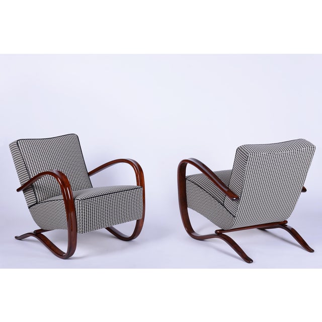 Model: h-269 conceived in the spirit of interwar art deco, this exceptionally iconic and dynamically shaped pair of...