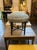 The Late 19th c. English Regency Bamboo Form Stool is a rare and elegant piece of antique furniture. This stool features a...