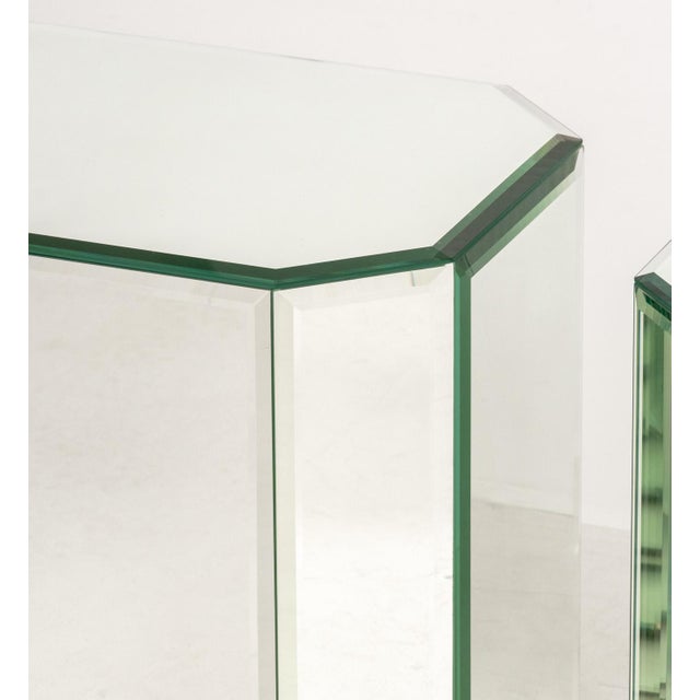 Group of Four Modern Mirrored Pedestal Tables, rectangular with canted corners. Largest: 17" H x 21" W x 13" D....
