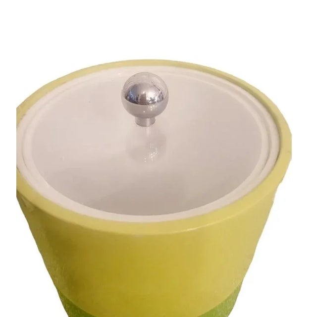 A fun summery vinyl extra tall ice bucket by The Bucket Brigade. The ice bucket is wrapped in 3 fun fresh colors with a...