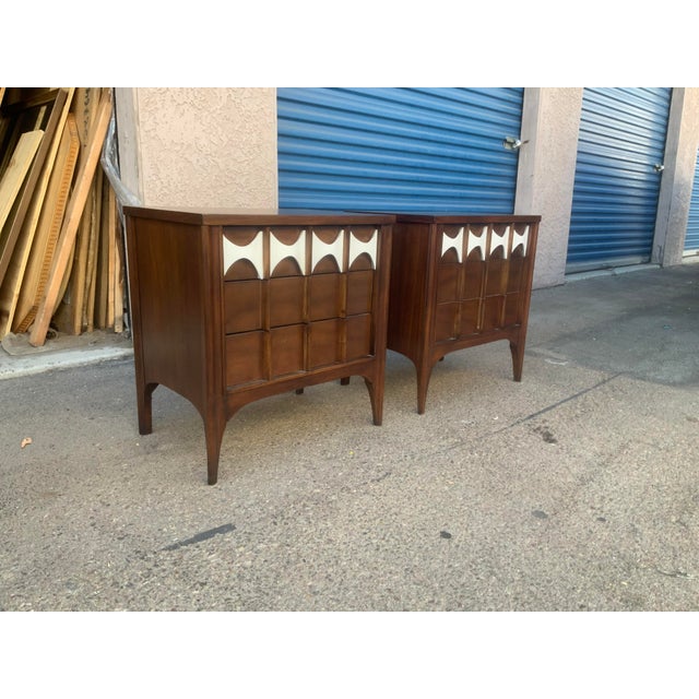 Stunning solid walnut mid century night stands. The pieces have 3 drawers. The modern mid century stand is well made and...