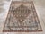 This mid-20th-century Persian Malayer accent rug presents a bold geometric composition centered on a large diamond-shaped...