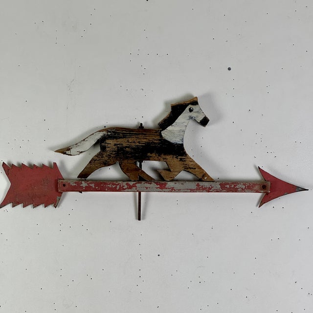 A delightful and lovely hand constructed 1920s weathervane. It's of a hand carved and painted wood horse galloping on a...
