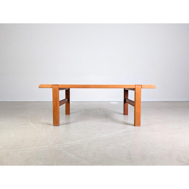 Beautiful, solid teak coffee table by Niels Bach from the 1970s. This high-quality table was made in Denmark and embodies...