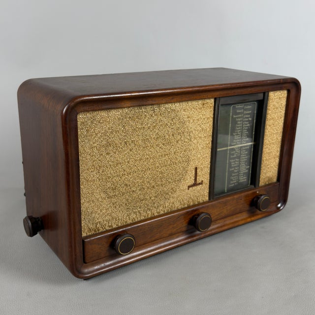 Vintage Swiss Type 2201 Valve Radio in Wood from Paillard, in Flawless conditions. Designed 1950 to 1959 This piece has an...