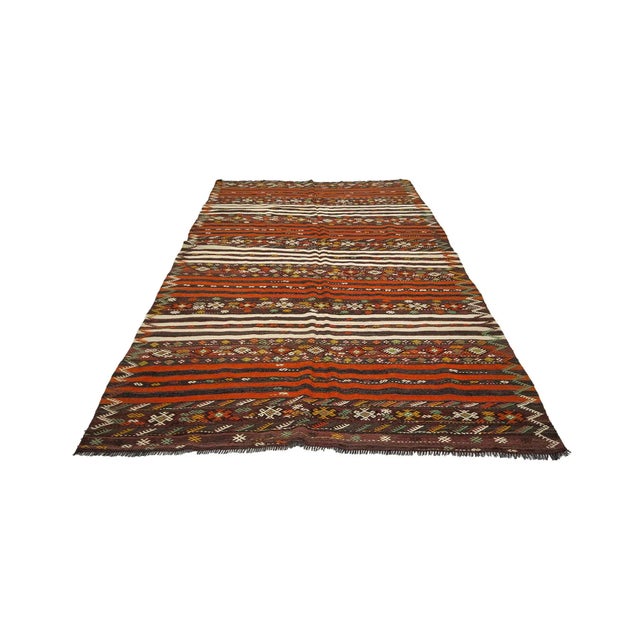 Handwoven vintage decorative kilim rug from Kars region of Turkey. Approximately 45-55 years old.In very good condition.