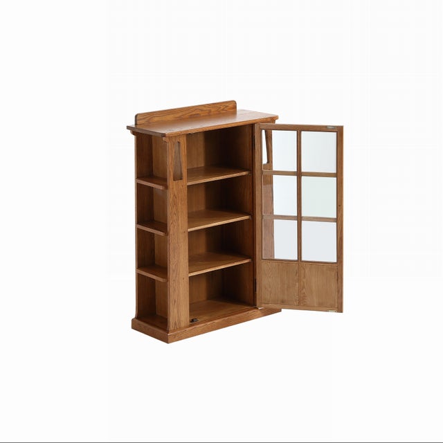 "The Mission 1 Door Bookcase with Side Shelves - Michael’s Cherry is a beautifully crafted piece that complements Mission...
