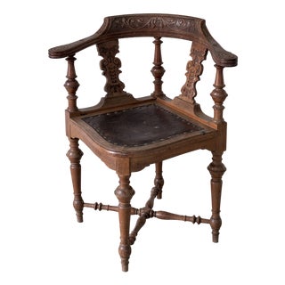 Antique Carved Corner Chair with Leather Seat For Sale