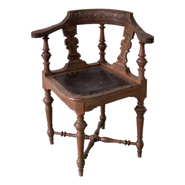 Antique Carved Corner Chair with Leather Seat For Sale