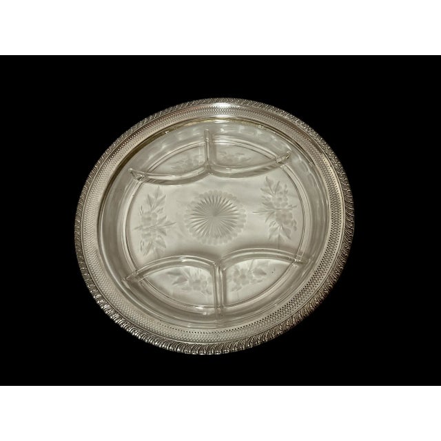 Beautiful etched crystal divided serving dish with sterling silver reticulated edge. Marked Sterling 5322.. This piece...