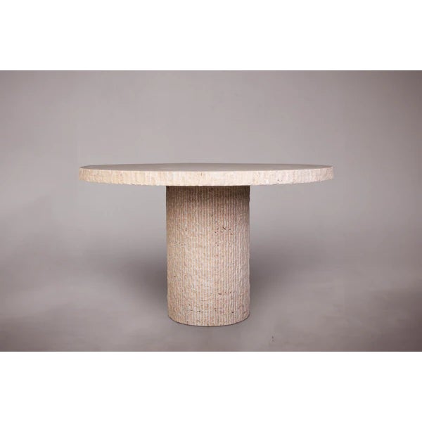 Introducing our exquisite round travertine table featuring a unique "burst edge" design, adding a touch of elegance to any...