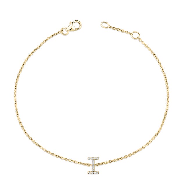 Immerse yourself in the understated elegance of this 10K yellow gold bracelet, for an enrapturing shimmer that captures...