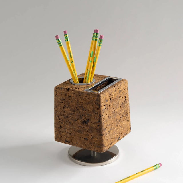 Mid-century modern rotating pen organizer made out of cork and chrome. Designed by Park Sherman. Condition: Excellent....