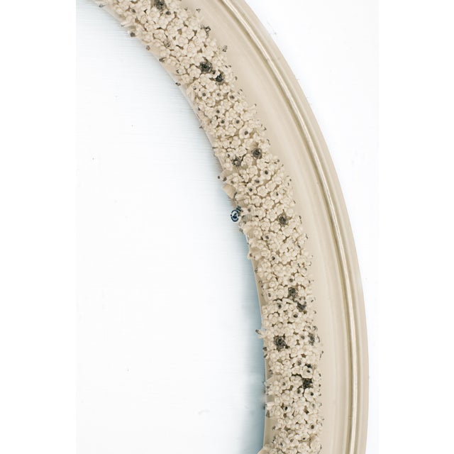 Elegant Italian oval wall mirror created by Giulio Tucci, renowned for his refined interpretation of the Neapolitan...